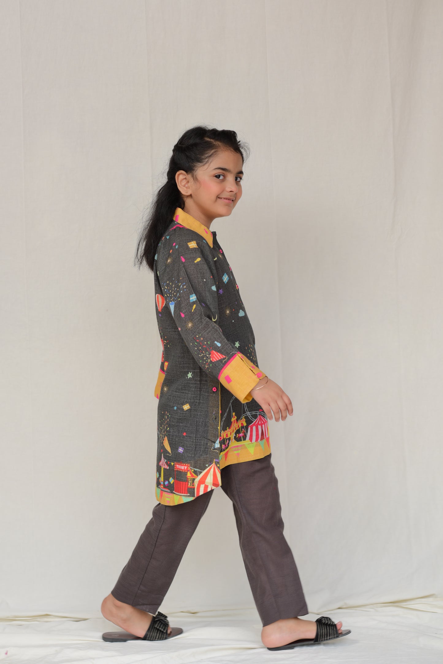 Enchanting Carnival-Themed Kids Kurta Set with Bold Colors and Patterns