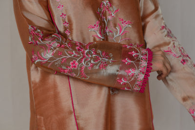 Orange Lamé Tissue fabric Embroidered Set with Vibrant Pink Dupatta